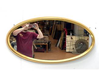 Lot 917 La Barge oval wall mirror. Gold gilt.