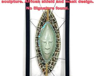 Lot 1389 Artisan Fused Glass Wall sculpture. African shield and mask design. No Signature found. 