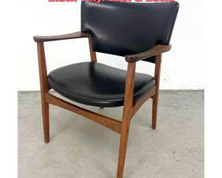 Lot 1203 MCM Danish Teak Arm Chair. Black Vinyl Seat Back. 