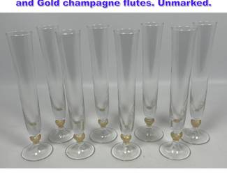 Lot 772 Set 8 Italian Murano Glass Twisted and Gold champagne flutes. Unmarked.