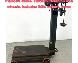 Lot 1684 Heavy Industrial FAIRBANKS Platform Scale. Platform scale on iron wheels. includes 50lb weight. Remn