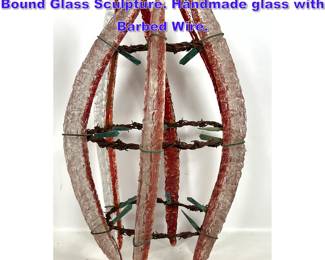 Lot 764 Barry Entner Abstract Modern Bound Glass Sculpture. Handmade glass with Barbed Wire.