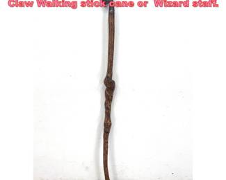 Lot 1463 Metal and wood. Glass ball and Claw Walking stick cane or Wizard staff.
