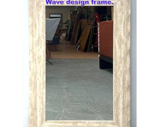 Lot 1001 Decorator Travertine Wall Mirror. Wave design frame.