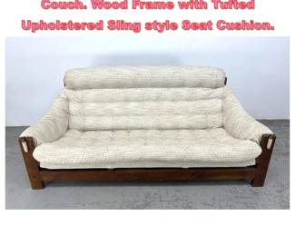 Lot 1582 Brazilian Style Modernist Sofa Couch. Wood Frame with Tufted Upholstered Sling style Seat Cushion. 