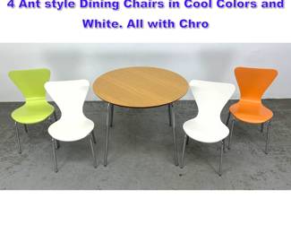 Lot 1010 Modern style Round Cafe Table. Set 4 Ant style Dining Chairs in Cool Colors and White. All with Chro