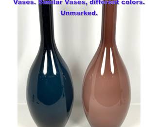 Lot 704 2pc Cased Glass Slender Neck Vases. Similar Vases, different colors. Unmarked.