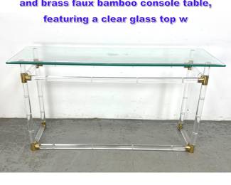 Lot 687 Charles Hollis Jones Style Lucite and brass faux bamboo console table, featuring a clear glass top w