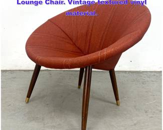 Lot 1002 Mid Century Modern Saucer Lounge Chair. Vintage textured vinyl material.