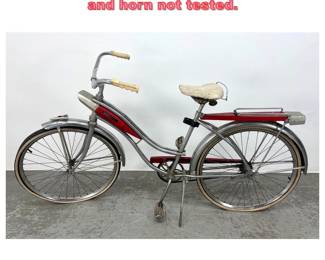 Lot 1656 Huffy silver jet cruiser bike. Light and horn not tested. 