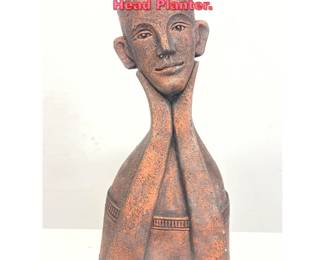 Lot 1296 Cast Figural Planter. Head Planter. 