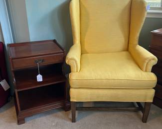 Mahogany side table by Hickory $58 
Yellow wing back chair, $125 each (Pair available) 