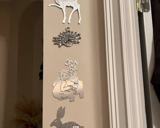 Drumm metal wall decor, $12 each.