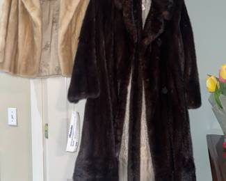 Higbee Co blonde mink short coat, $145

Vintage, brand new with tags, Parisian furrier, Cleveland chocolate mink fur with matching belt long coat, with pockets. Perfect condition, $495.
