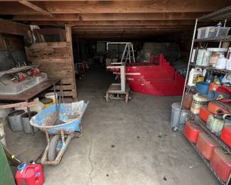 Boat gas cans, paint and chems, utility cart, jewelers work bench polisher, barn and farm tools.
