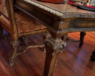 Large dining table. Leaves are currently in it. Can be smaller.   Has  8 large chairs. And there is a matching buffet. High end. Buffet is large and gorgeous. Table and chairs $1250. Sideboard $800. 