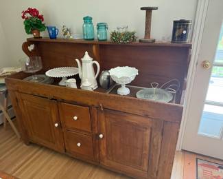 Double dry sink. 
Lots of milk glass in home, Ball canning jars, etc. 