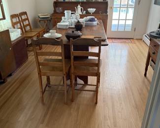 Hutch table. 
Set four chairs. 
Lots of collectibles through home. 