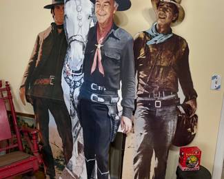 Cowboy Cardboard Cutouts of Clint Eastwood, Hopalong Cassidy and John Wayne.
