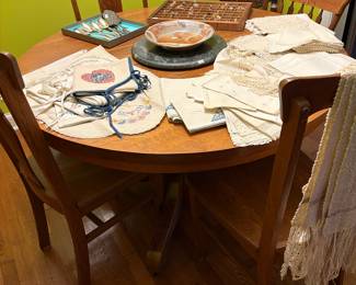 Antique pedestal round table and chairs