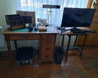 Smart TV, DVD player, desk, camera tripods, rolling table