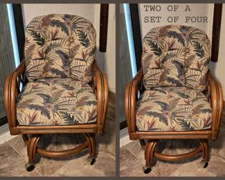 Two of a Set of Four Rattan Chairs on Wheels