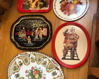 Assorted metal trays including 1980s Coca-Cola Santa trays 