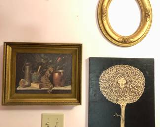 Clockwise from left: print, oval gilt frame, interesting painting