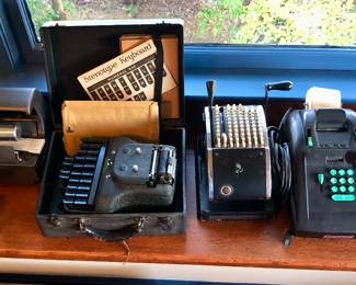 Vintage office equipment: Dictaphone, Stenotype Master Model 4, Victor adding machine, check writers