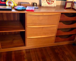Interior of long teak dresser