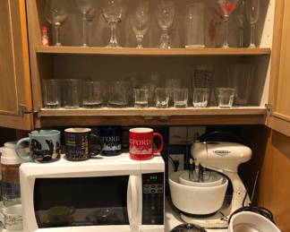 Microwave, vintage Hamilton Beach stand mixer with juicer attachment, glasses & stemware
