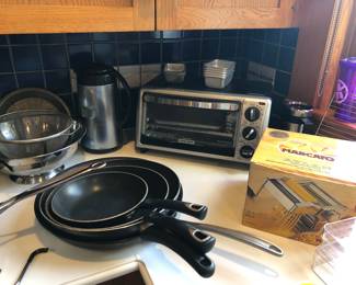 Colanders, like-new Black & Decker toaster oven, skillets, Atlas pasta maker (Italy) 