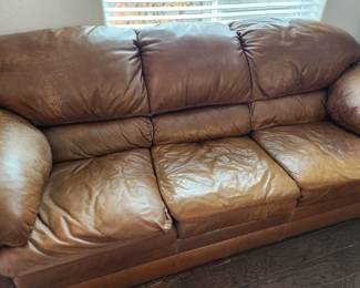 Two Brown Leather Sofas