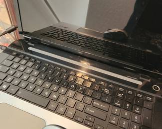 Toshiba Laptop. Logitech wireless Mouse. 