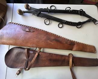 Vintage horse hames and rifle scabbard.