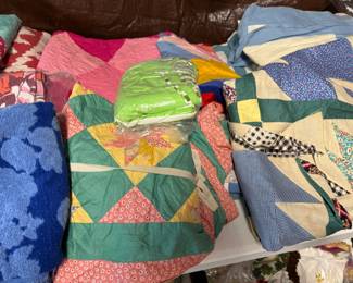 Vintage quilts, towels, quilt tops