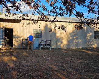 shop is big, see how small Robert is