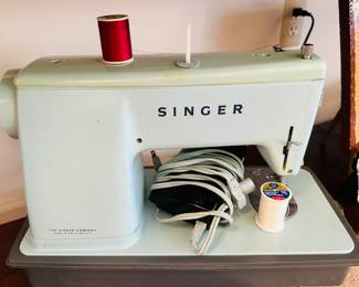 Vintage Singer Sewing Machine in Robins Egg Blue, Comes with Case.