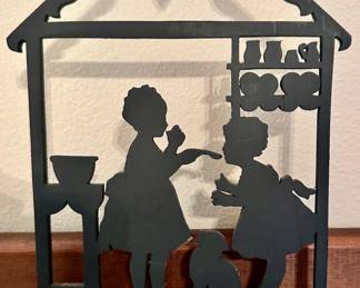 Trio of Vintage Thimbles, One Signed W. Smith and A Collectors Virginia Thimble Shown in Front of a Wooden Silhouette Decoration.