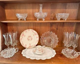 Vintage Footed Lead Crystal Basket (Germany) Shown Additional Early American Cut Glas and on the Lower Shelf Two Sets of 4 Candlewick Parfait Tumblers/Champagne Glasses, an Elite Works by Limoges Biscuit Plate Shown with a Noritake "Bosnia" Dainty Teacup & Saucer Set.