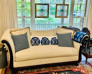 Incredible One Cushion Sofa and Lovely Stain Glass Windows