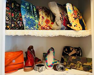 Several Vera Bradley Quilted & Canvas Bags and on the Lower Shelf we have an Anne Klein Shoulder Purse Available Shown with Liebes Kind Camo Clutch, MOU Slip on High Tops in Size 38, A.S. 98 Zip Up Platform Hells in Size 42 and a Giani Bernini Orange Shoulder Purse and Finally we have Justin and Silver Star Belts Avilable.