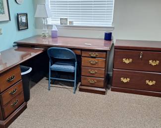 Corner hardwood desk and wood filing cabinet. (blue folding chair not available)