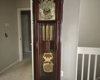 Sligh brand Grandfather Clock. Casing and components are beautiful. This has been at the shop for a gear fix, currently does not run but we have all connections for the buyer to continue its service schedule. Brought back from the shop to try and sell since there is no room in mom's new small apartment. 