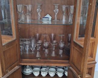 This pic shows how much storage the larger curio cabinet has. 