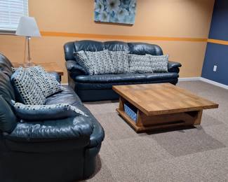 Leather couch and love seat. Sturdy hardwood coffee table and side table sold separately. 