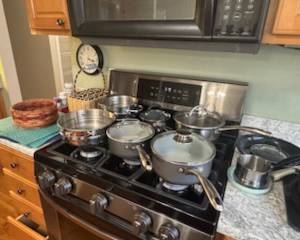 More kitchen supplies - pots and pans, cookware