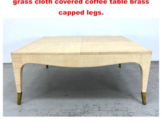 Lot 1724 Hollywood Regency aesthetic grass cloth covered coffee table brass capped legs. 