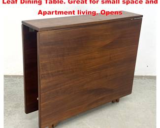 Lot 1484 Mid Century Modern Walnut Drop Leaf Dining Table. Great for small space and Apartment living. Opens 