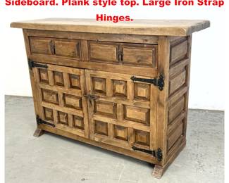 Lot 1573 Rustic Paneled Door Continental Sideboard. Plank style top. Large Iron Strap Hinges. 